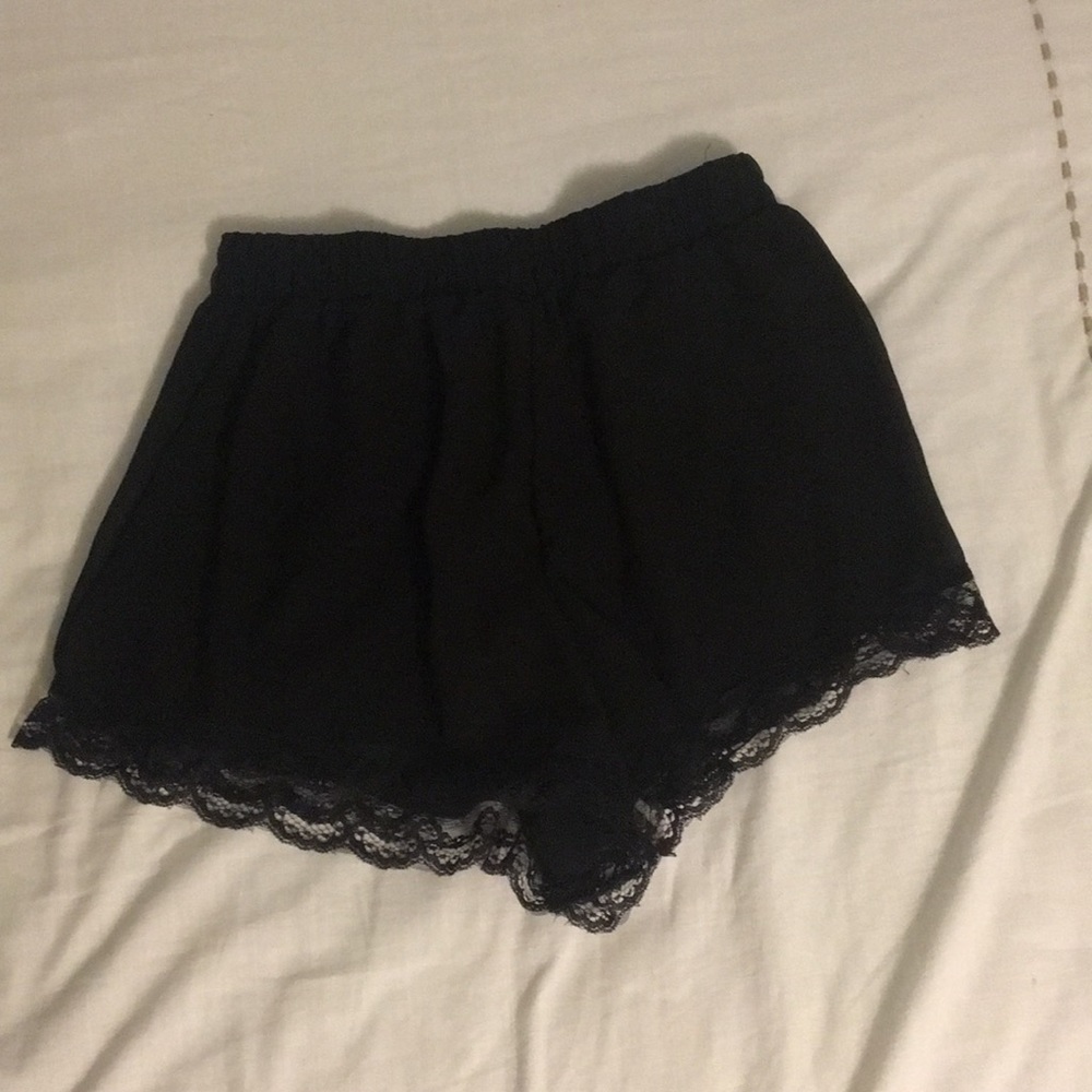 Black dressy shorts with lace bottom.